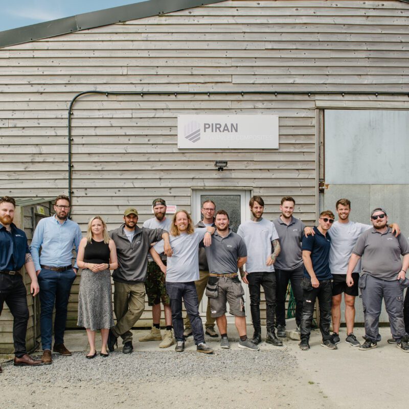 The whole Piran composite team outside their workshop.