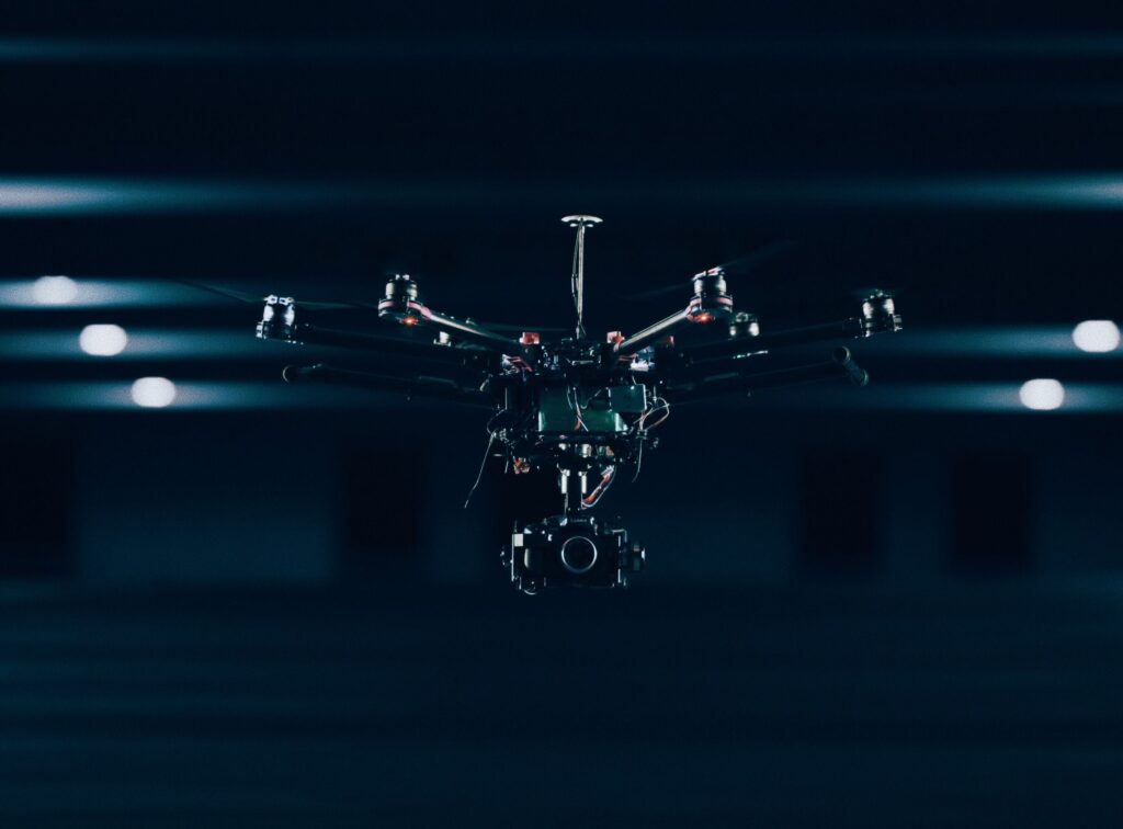 UAVs 3 Drone flying holding a camera