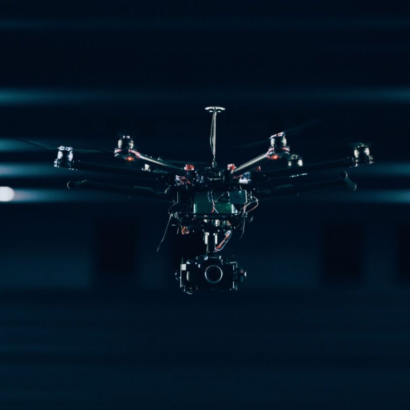 Drone flying holding a camera